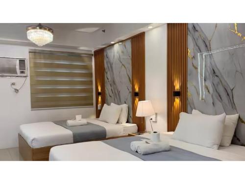 Relax in Pasay Citys Best Kept Secret - Spacious Condo with Garden View, Манила
