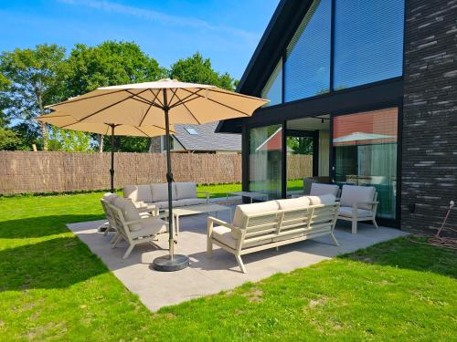 شرفة/ تراس, Luxe vakantievilla BG04 in Biggekerke