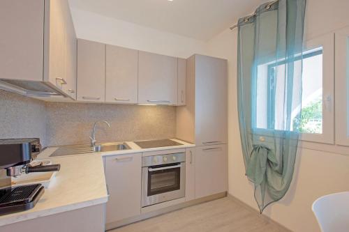 Cocina, Marlin Suite Apartment in Grosseto