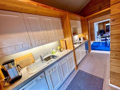 Kitchen, Villa Mustikka - Modern Log Villa on a Waterfront Estate in Bromarv