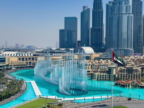 GRANDE SIGNATURE with a direct Burj Khalifa view and Private Fountain Show with DXB AIRPORT VIP Shuttle option for 6 guests, Dubai