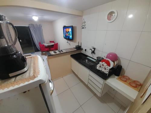 مطبخ, Casa 2qts Churrasqueira Condomínio Pássaros Peró (Casa 2qts Churrasqueira Condominio Passaros Pero) in Jardim Pero