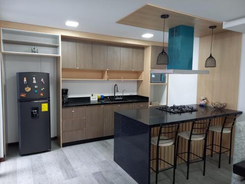 Kitchen, Casa SC in Azogues