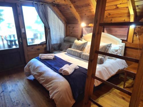 Plett Forest Cabins - Tap to explore photos
