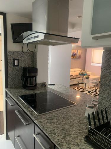 Kitchen, Apartamento Vacacional en la zona mas cotizada de Lecheria near Lavandería Margarita