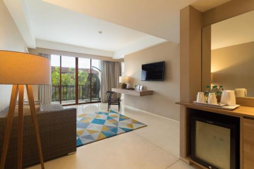 Junior Suite with Balcony room in Grand Zuri Kuta Bali Hotel