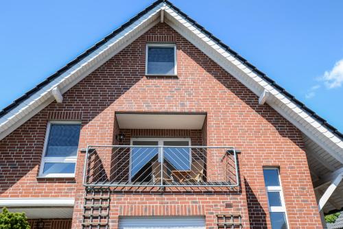 شرفة/ تراس, Ferienwohnung Rhader Wiesen in دورستين