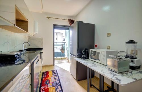 Kitchen, Sejour de Luxe Les Oliviers in Al Mohammadi