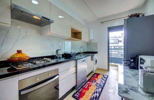 Kitchen, Sejour de Luxe Les Oliviers in Al Mohammadi