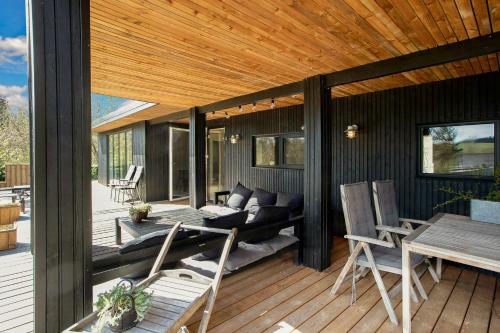 Exterior view, Nordic Style In Mols Hills Overlooking Lake in Krakaer