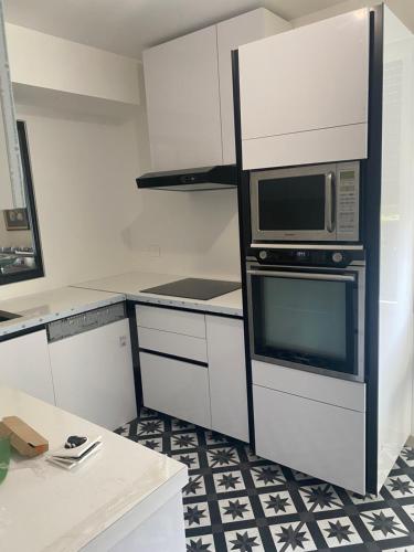 keittiö, PENTHOUSE Terrasse vue Paris 7mn Montparnasse et 5mn Porte de Versailles in Issy-Les-Moulineaux