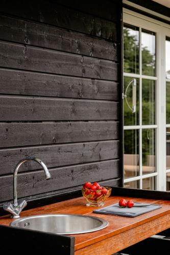 ทัศนียภาพภายนอกโรงแรม, Home Among Trees With Architectural Flair in ดรอนนิงเมิลเลอ