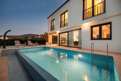 Holiday house with a swimming pool Vrbnik, Krk - 24519
