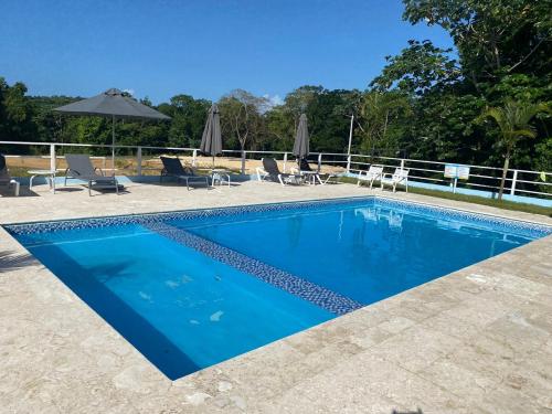 Swimming pool, Cozy Tropical Getaway in Los Charamicos