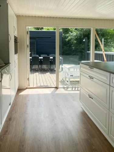 Exterior view, Home At The Front Row By Hou Beach in Hals