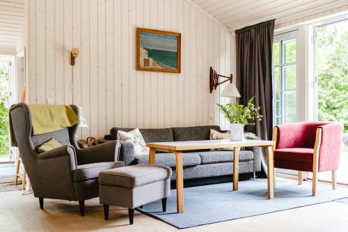 ทัศนียภาพภายนอกโรงแรม, Home Among Trees With Architectural Flair in ดรอนนิงเมิลเลอ