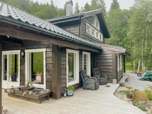 Зовнішній вигляд готелю, Cozy Modern Cabin In West Norway With View in Алфотен
