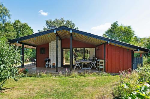 The Red Summer House With The Lush Garden At Asnæs