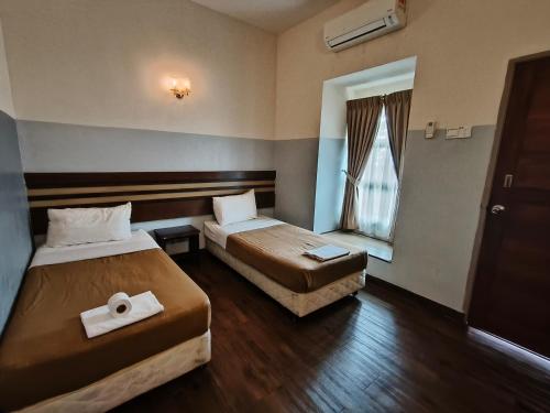 Cozzy Motel Malacca - Tap to explore photos