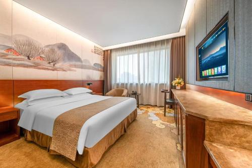 Eagle City Xindi Hotel in Erqi