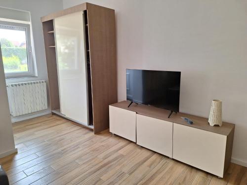 Közös társalgó / TV, Vacanza 021 apartman in Salajka