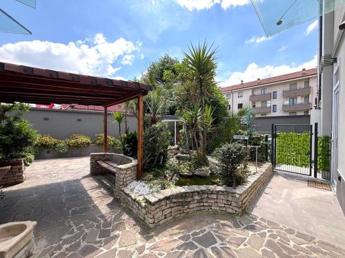 Сад, Residence Oasi Di Monza in Монца