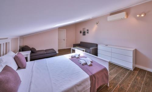 Begonya Suites - Tap to explore photos