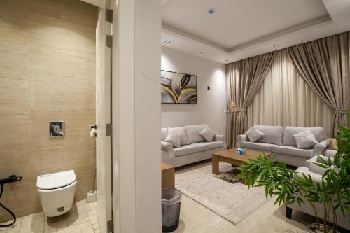 Luxurious two-bedroom apartment compound Al Malqa district - Tap to explore photos