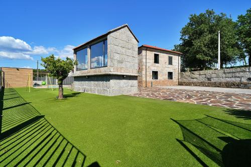 花園, Lujosa villa con piscina in 里巴杜米亞