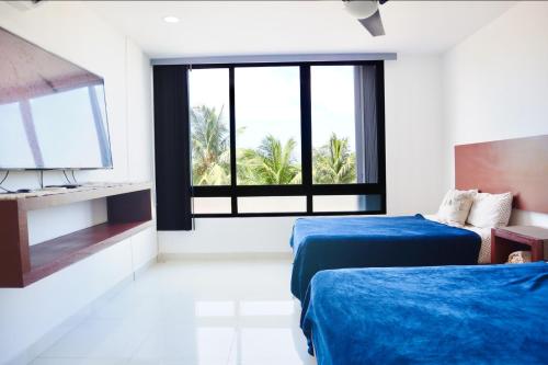 Central, beachside + rooftop w/infinity pool, Канкун (фото 8)