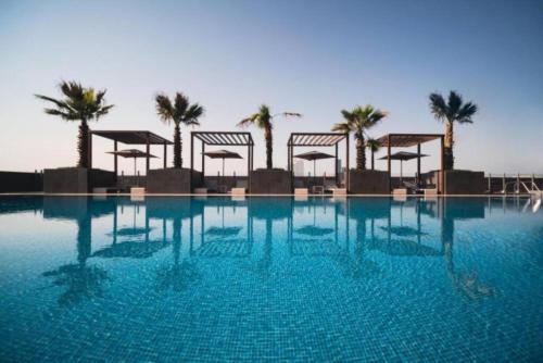 Vacationer I JVC Gem 1 Bedroom I Free Pool, Gym, Parking & Wi-Fi, Dubaj (fotografie 2)
