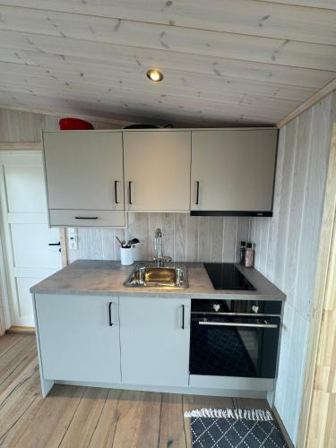 Cocina, Leilighet på Herøy (Leilighet pa Herøy) in Sandnessjoen