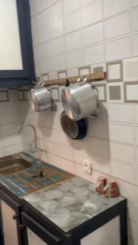 кухня, Résidence REHA, appart 2CH (Residence REHA, appart 2CH) in Бафоссам