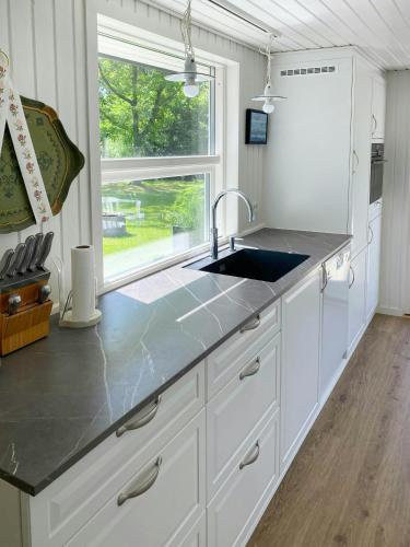 Exterior view, Home At The Front Row By Hou Beach in Hals