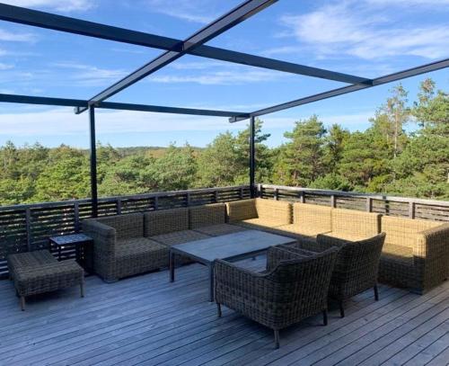 Vista exterior, Live Among Trees In An Architect Drawn Cabin in Skjaerhalden