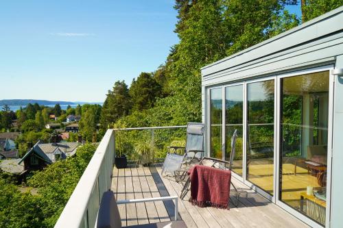 Balcony/terrace, Treetop feeling 190 sqm with amazing views in Ullern