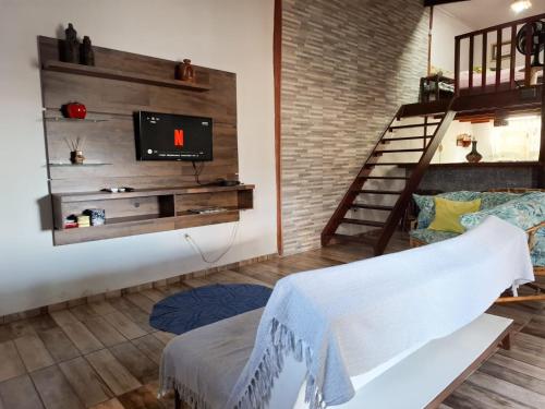 ห้องส่วนกลางสำหรับนั่งเล่น/ดูทีวี, Casa Vista Baepi - Estilo Boho, Mais Streaming a 1,5km da Balsa in กัมบากวารา