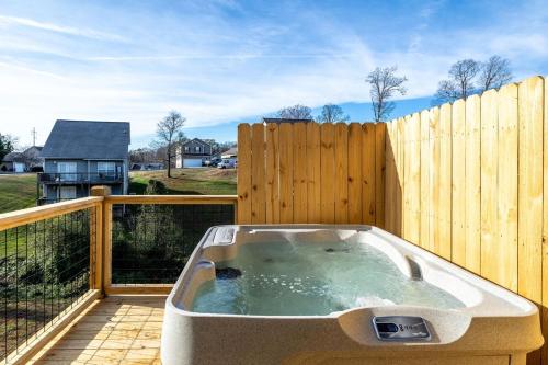 Cozy Cabin Retreat w Arcade Hot Tub near Dolly