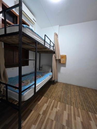 Single Bed in 4-Bed Dormitory Room room in LuangPrabang Aurora Hostel