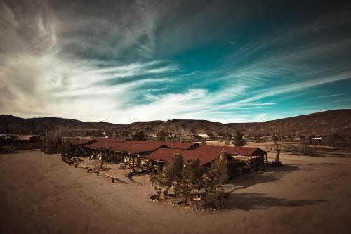 Pioneertown Motel Pioneertown Motel is conveniently located in the popular Pioneertown area. The property offers a high standard of service and amenities to suit the individual needs of all travelers. Service-minded st