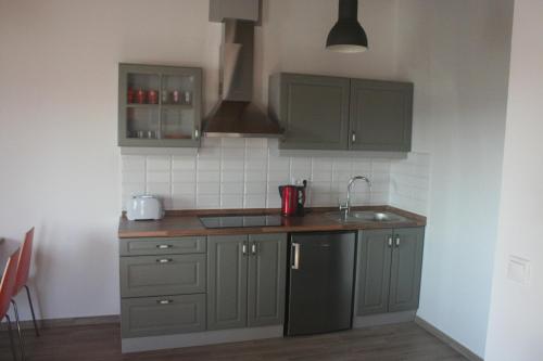 keuken, Malomko Apartman in Zsira