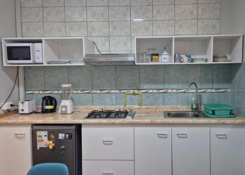 Kitchen, Hostal Iria in Antofagasta