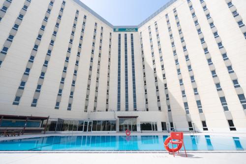 Kolam renang, Acacia Hotel by Blue Collection in Ras Al Khaimah