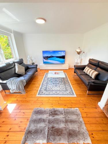 Garden Lakehouse Sauna Kamin Grill Billard Darts Modernes Ferienhaus in Seenahe mit Garten und Spiel in Klein Ronnau