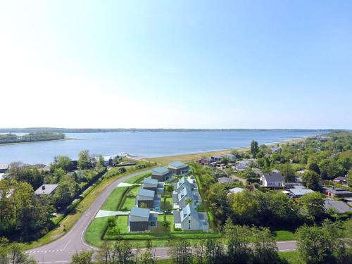 Villa Maroma Regal Veerse Meer, gratis 4 E-bikes, gratis laden EV, trampoline in Kamperland