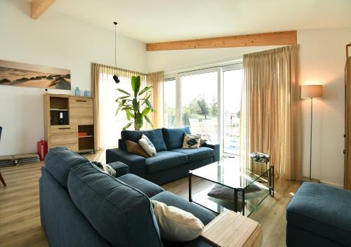 Villa Maroma Mistral Veerse Meer gratis 4 E-bikes gratis laden EV trampoline in Kamperland