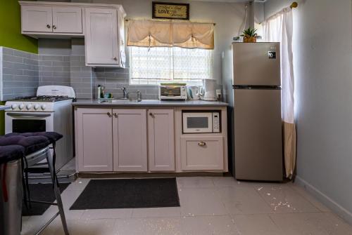 Modern Apartment near Pigeon Point with Breakfast in Kraunpointa