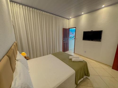 Casa com Ar e Churrasqueira na Prainha de Mambucaba in Portal das Artes