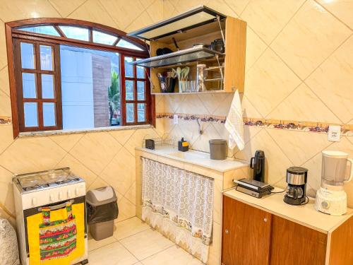 Casa com Ar e Churrasqueira na Prainha de Mambucaba in Portal das Artes