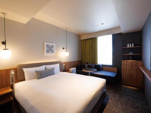 Comfort Queen Room with Sofa Bed room in CROSS life Hakata Tenjin
